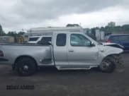 ✅ 1998 Ford F-150 XL • VIN: 2FTRX07L5WCA04601 • Lot: 42767325. Wystawiony na IAAI z przebiegiem 168 949 mil. Bezpłatny archiwum sprzedaży aukcyjnych z USA i szczegółowy raport historii pojazdu na DreamBid. Zdjęcie 13.