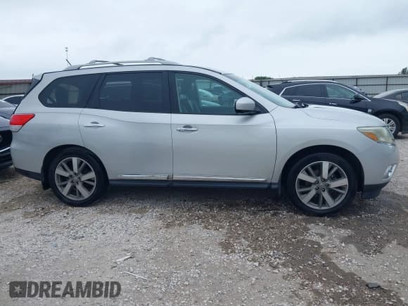 ✅ 2015 Nissan Pathfinder Platinum • VIN: 5N1AR2MM9FC709869 • Lot: 42598205. Listed on IAAI with 112,051 mi. Free auction sales archive from the USA and detailed vehicle history report at DreamBid. Image 14.