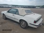 ✅ 1987 Pontiac Sunbird • VIN: 1G2JD31K1H7575709 • Lot: 42335768. Wystawiony na IAAI z przebiegiem 613 977 mil. Bezpłatny archiwum sprzedaży aukcyjnych z USA i szczegółowy raport historii pojazdu na DreamBid. Zdjęcie 3.