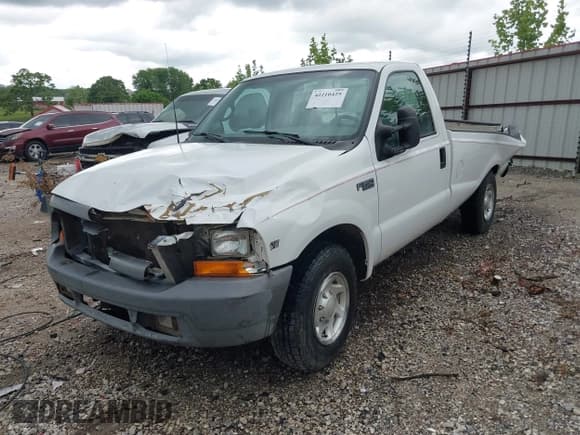 ✅ 1999 Ford F-250 XL • VIN: 1FTNF20L7XEA00374 • Lot: 42210425. Listed on IAAI with 73,885 mi. Free auction sales archive from the USA and detailed vehicle history report at DreamBid. Image 2.