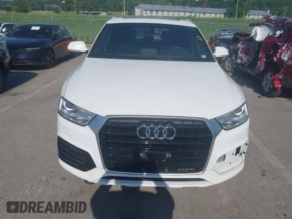 ✅ 2018 Audi Q3 Premium • VIN: WA1BCCFS6JR014230 • Lot: 42745008. Wystawiony na IAAI z przebiegiem 131 417 mil. Bezpłatny archiwum sprzedaży aukcyjnych z USA i szczegółowy raport historii pojazdu na DreamBid. Zdjęcie 12.