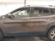 ✅ 2015 Jeep Cherokee Trailhawk • VIN: 1C4PJMBS7FW772728 • Лот: 43302956. Опубликован ранее на IAAI с пробегом 117 440 миль. Бесплатный доступ к архиву аукционных продаж из США и подробный отчёт об истории автомобиля на DreamBid. Изображение 15.