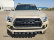 ✅ 2018 Toyota Tacoma SR5 • VIN: 5TFSZ5AN9JX141602 • Lot: 61573115. Listed on Copart with 102,677 mi. Free auction sales archive from the USA and detailed vehicle history report at DreamBid. Image 5.