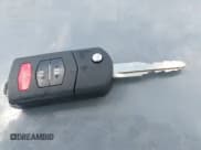 ✅ 2012 Mazda 3 i Touring • VIN: JM1BL1L8XC1686831 • Lot: 42373850. Listed on IAAI with 152,067 mi. Free auction sales archive from the USA and detailed vehicle history report at DreamBid. Image 11.