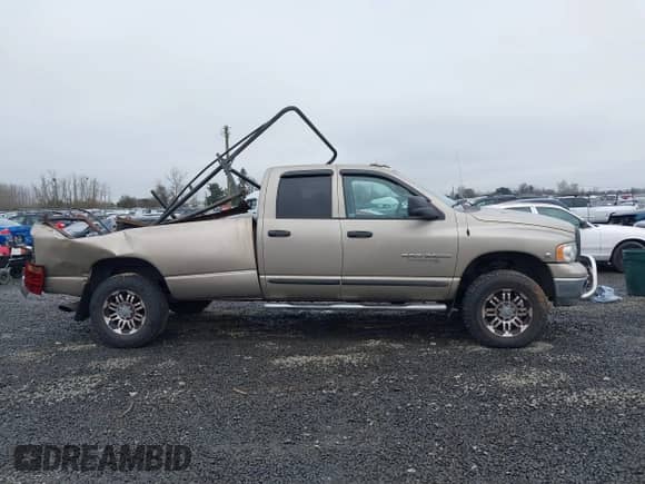 2005 Dodge 3500 SLT z VIN 3D7LS38C25G742321, wystawiony jako IAAI lot #41311486 z przebiegiem 244 511 mil mil oraz . Historia ofert i sprzedaży dostępna na DreamBid. Obrazek 14.