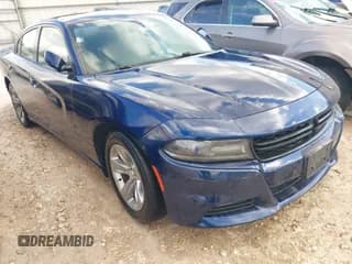✅ 2015 Dodge Charger SXT • VIN: 2C3CDXHG3FH878655 • Lot: 43553155. Listed on IAAI with 128,649 mi. Free auction sales archive from the USA and detailed vehicle history report at DreamBid. Image 1.