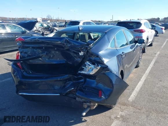 ✅ 2019 Honda Civic EX • VIN: 19XFC1F34KE204349 • Lot: 43780668. Listed on IAAI with 70,089 mi. Free auction sales archive from the USA and detailed vehicle history report at DreamBid. Image 4.
