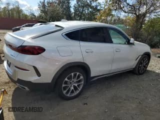 ✅ 2020 BMW X6 xDrive40i • VIN: 5UXCY6C05L9D46440 • Лот: 89814525. Опубликован ранее на Copart с пробегом 110 877 миль. Бесплатный доступ к архиву аукционных продаж из США и подробный отчёт об истории автомобиля на DreamBid. Изображение 3.