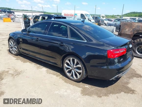 ✅ 2014 Audi A6 Prestige • VIN: WAUHGAFC9EN027338 • Lot: 42377190. Listed on IAAI with 164,427 mi. Free auction sales archive from the USA and detailed vehicle history report at DreamBid. Image 3.
