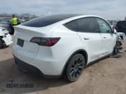 ✅ 2023 Tesla Model Y Long Range • VIN: 7SAYGDEE3PA072042 • Lot: 41795216. Listed on IAAI with 40,905 mi. Free auction sales archive from the USA and detailed vehicle history report at DreamBid. Image 4.