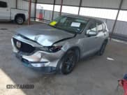 ✅ 2020 Mazda CX-5 Touring • VIN: JM3KFACM8L1770738 • Lot: 43237475. Wystawiony na IAAI z przebiegiem 96 169 mil. Bezpłatny archiwum sprzedaży aukcyjnych z USA i szczegółowy raport historii pojazdu na DreamBid. Zdjęcie 17.