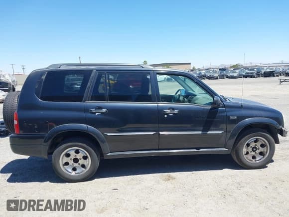✅ 2002 Suzuki XL7 Standard • VIN: JS3TX92V124122384 • Лот: 42709086. Опубликован ранее на IAAI с пробегом 196 311 миль. Бесплатный доступ к архиву аукционных продаж из США и подробный отчёт об истории автомобиля на DreamBid. Изображение 14.