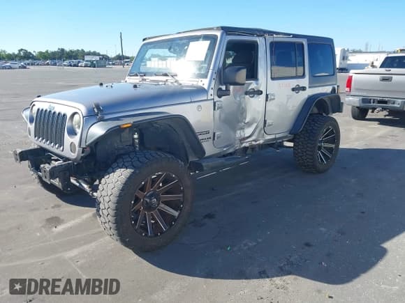 ✅ 2016 Jeep Wrangler Unlimited Sport • VIN: 1C4BJWDG5GL199068 • Lot: 43518427. Listed on IAAI with 110,325 mi. Free auction sales archive from the USA and detailed vehicle history report at DreamBid. Image 17.