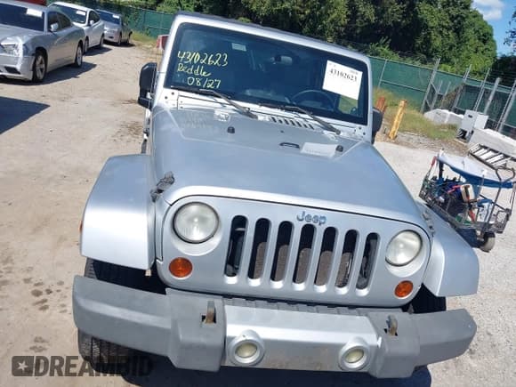 ✅ 2008 Jeep Wrangler Unlimited Sahara • VIN: 1J8GA591X8L628123 • Lot: 43102623. Listed on IAAI with 231,500 mi. Free auction sales archive from the USA and detailed vehicle history report at DreamBid. Image 12.