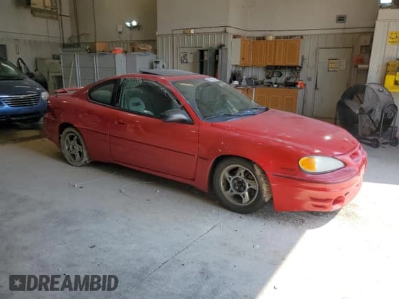 ✅ 2003 Pontiac Grand Am GT • VIN: 1G2NW12E43C103139 • Лот: 62676404. Опубликован ранее на Copart с пробегом 157 043 миль. Бесплатный доступ к архиву аукционных продаж из США и подробный отчёт об истории автомобиля на DreamBid. Изображение 4.