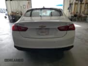 ✅ 2018 Chevrolet Malibu LT • VIN: 1G1ZD5STXJF124865 • Lot: 91227205. Listed on Copart with 73,625 mi. Free auction sales archive from the USA and detailed vehicle history report at DreamBid. Image 6.