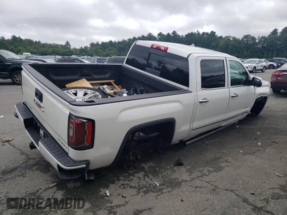 ✅ 2017 GMC Sierra 1500 Denali • VIN: 3GTU2PEJ5HG384421 • Lot: 65869314. Listed on Copart with 116,426 mi. Free auction sales archive from the USA and detailed vehicle history report at DreamBid. Image 3.