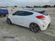 2012 Hyundai Veloster w/Red Int с VIN KMHTC6AD4CU076435, выставлен на аукционе Copart как лот 73015964 с пробегом 136 324 миль миль и Списание • Salvage title. История ставок и продаж доступна на DreamBid. Изображение 2.