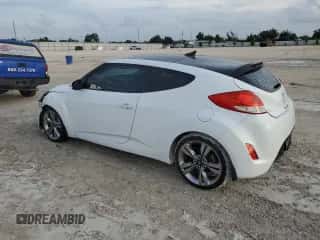 2012 Hyundai Veloster w/Red Int с VIN KMHTC6AD4CU076435, выставлен на аукционе Copart как лот 73015964 с пробегом 136 324 миль миль и Списание • Salvage title. История ставок и продаж доступна на DreamBid. Изображение 2.