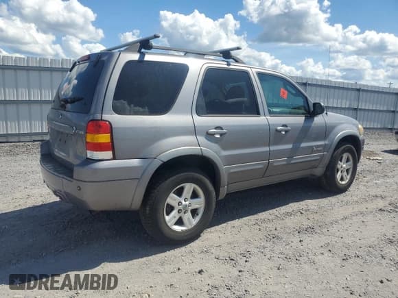 ✅ 2007 Ford Escape Hybrid • VIN: 1FMCU49H07KB60889 • Lot: 71118925. Wystawiony na Copart z przebiegiem 99 990 mil. Bezpłatny archiwum sprzedaży aukcyjnych z USA i szczegółowy raport historii pojazdu na DreamBid. Zdjęcie 3.