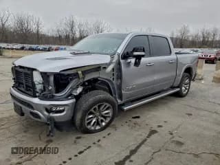 ✅ 2021 Ram 1500 Laramie • VIN: 1C6SRFJT7MN623352 • Lot: 93323305. Listed on Copart with 96,523 mi. Free auction sales archive from the USA and detailed vehicle history report at DreamBid. Image 1.
