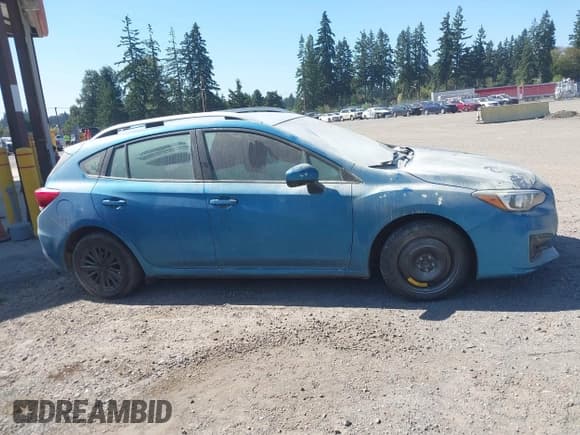 ✅ 2017 Subaru Impreza Premium • VIN: 4S3GTAB65H3732745 • Lot: 43060760. Listed on IAAI with 141,614 mi. Free auction sales archive from the USA and detailed vehicle history report at DreamBid. Image 13.