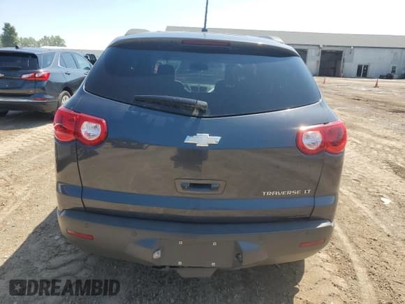 ✅ 2012 Chevrolet Traverse 2LT • VIN: 1GNKRJED2CJ258008 • Lot: 65991464. Wystawiony na Copart z przebiegiem 163 294 mil. Bezpłatny archiwum sprzedaży aukcyjnych z USA i szczegółowy raport historii pojazdu na DreamBid. Zdjęcie 6.
