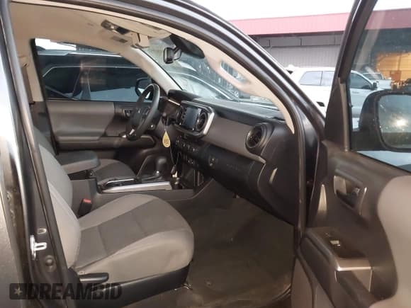 ✅ 2023 Toyota Tacoma SR5 • VIN: 3TMAZ5CN6PM199982 • Lot: 43087053. Listed on IAAI with 38,883 mi. Free auction sales archive from the USA and detailed vehicle history report at DreamBid. Image 5.