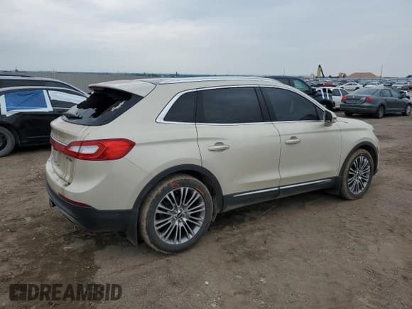 ✅ 2016 Lincoln MKX Reserve • VIN: 2LMPJ6LP4GBL43720 • Lot: 59575105. Wystawiony na Copart z przebiegiem 128 751 mil. Bezpłatny archiwum sprzedaży aukcyjnych z USA i szczegółowy raport historii pojazdu na DreamBid. Zdjęcie 3.