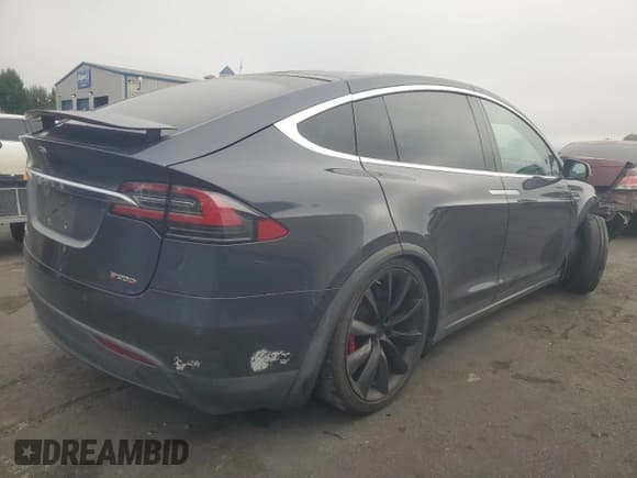 ✅ 2016 Tesla Model X P90D • VIN: 5YJXCBE40GF016983 • Lot: 90803555. Listed on Copart with 167,000 mi. Free auction sales archive from the USA and detailed vehicle history report at DreamBid. Image 3.