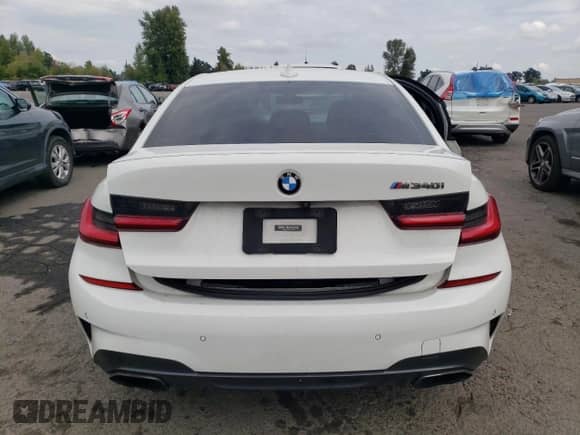 2020 BMW 3 Series M340i z VIN WBA5U7C07LFH55758, wystawiony jako Copart lot #71877665 z przebiegiem Nie podano mil oraz Szkoda całkowita • Salvage title. Historia ofert i sprzedaży dostępna na DreamBid. Obrazek 6.