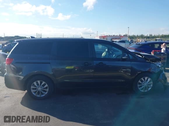 ✅ 2021 Kia Sedona LX • VIN: KNDMB5C13M6668309 • Lot: 43597871. Listed on IAAI with 58,978 mi. Free auction sales archive from the USA and detailed vehicle history report at DreamBid. Image 12.