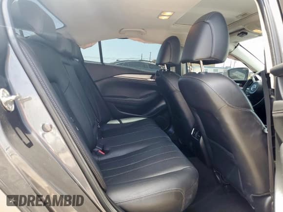 ✅ 2020 Mazda 6 Grand Touring Reserve • VIN: JM1GL1WY1L1518304 • Лот: 66898065. Опубликован ранее на Copart с пробегом 66 312 миль. Бесплатный доступ к архиву аукционных продаж из США и подробный отчёт об истории автомобиля на DreamBid. Изображение 10.