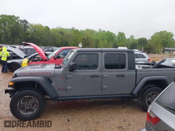 ✅ 2021 Jeep Gladiator Rubicon • VIN: 1C6JJTBG4ML534689 • Lot: 41999686. Listed on IAAI with 33,531 mi. Free auction sales archive from the USA and detailed vehicle history report at DreamBid. Image 14.