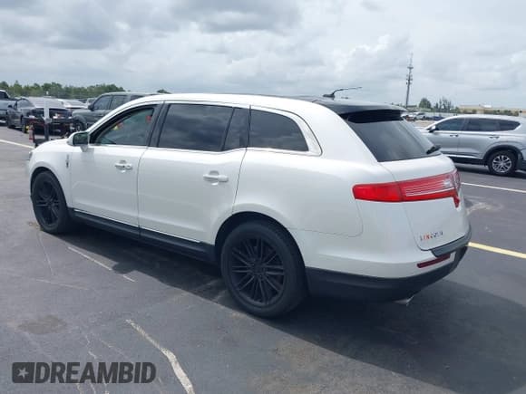 ✅ 2015 Lincoln MKT EcoBoost • VIN: 2LMHJ5AT0FBL01414 • Lot: 42769825. Listed on IAAI with 126,223 mi. Free auction sales archive from the USA and detailed vehicle history report at DreamBid. Image 3.