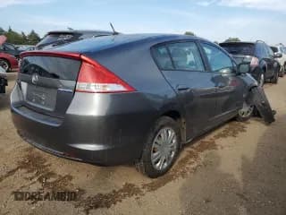 ✅ 2010 Honda Insight LX • VIN: JHMZE2H52AS019478 • Лот: 67657704. Опубликован ранее на Copart с пробегом 186 688 миль. Бесплатный доступ к архиву аукционных продаж из США и подробный отчёт об истории автомобиля на DreamBid. Изображение 3.