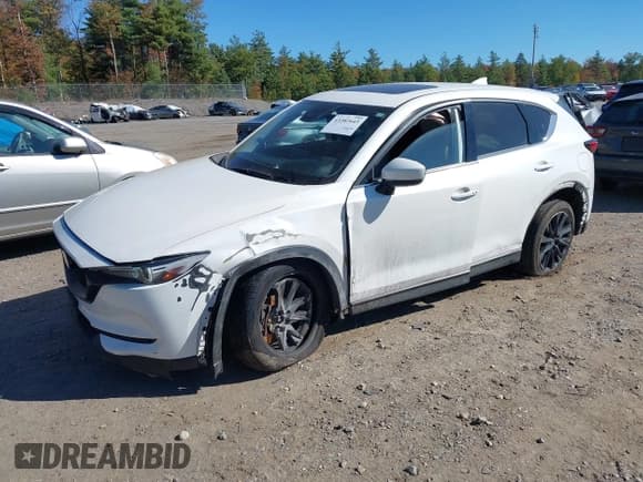 ✅ 2021 Mazda CX-5 Grand Touring • VIN: JM3KFBDM2M0470446 • Лот: 43382643. Опубликован ранее на IAAI с пробегом 67 536 миль. Бесплатный доступ к архиву аукционных продаж из США и подробный отчёт об истории автомобиля на DreamBid. Изображение 2.