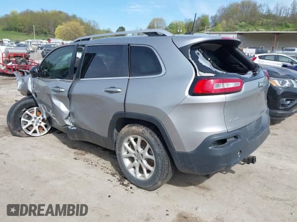 ✅ 2016 Jeep Cherokee 75th Anniversary • VIN: 1C4PJMCB6GW252956 • Lot: 42111535. Listed on IAAI with 131,000 mi. Free auction sales archive from the USA and detailed vehicle history report at DreamBid. Image 3.
