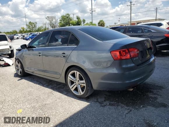 ✅ 2013 Volkswagen Jetta SE • VIN: 3VWDP7AJ1DM392628 • Lot: 65771255. Listed on Copart with 169,567 mi. Free auction sales archive from the USA and detailed vehicle history report at DreamBid. Image 2.