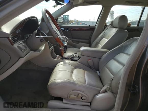 ✅ 2001 Cadillac DeVille DTS • VIN: 1G6KF57961U249148 • Lot: 73604474. Listed on Copart with 137,444 mi. Free auction sales archive from the USA and detailed vehicle history report at DreamBid. Image 7.