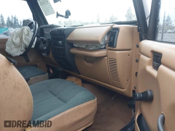 ✅ 1998 Jeep Wrangler Sahara • VIN: 1J4FY49S6WP714014 • Lot: 43531333. Listed on IAAI with 148,254 mi. Free auction sales archive from the USA and detailed vehicle history report at DreamBid. Image 5.