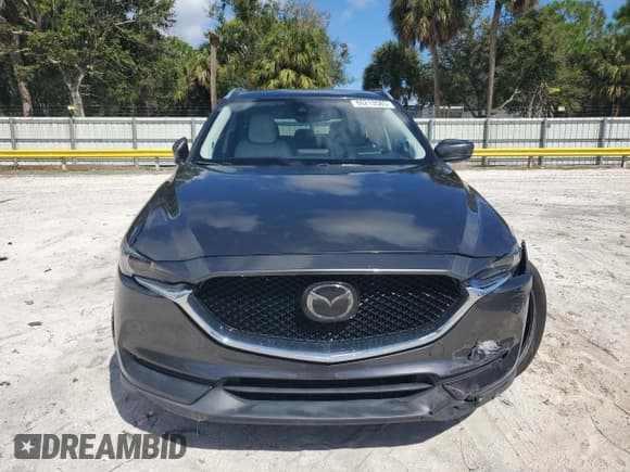 ✅ 2019 Mazda CX-5 Grand Touring • VIN: JM3KFADM7K0622051 • Lot: 86213585. Listed on Copart with 68,022 mi. Free auction sales archive from the USA and detailed vehicle history report at DreamBid. Image 5.