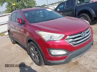 2015 Hyundai Santa Fe z VIN 5XYZU3LB0FG235754, wystawiony jako IAAI lot #43240391 z przebiegiem 152 266 mil mil oraz . Historia ofert i sprzedaży dostępna na DreamBid. Obrazek 1.
