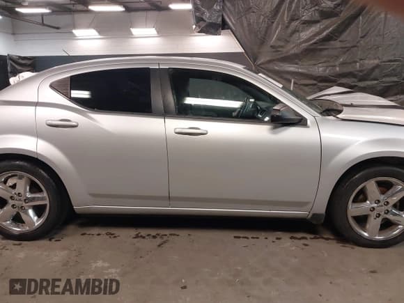 ✅ 2012 Dodge Avenger SE • VIN: 1C3CDZAB0CN252204 • Лот: 41156425. Опубликован ранее на IAAI с пробегом 133 522 миль. Бесплатный доступ к архиву аукционных продаж из США и подробный отчёт об истории автомобиля на DreamBid. Изображение 13.