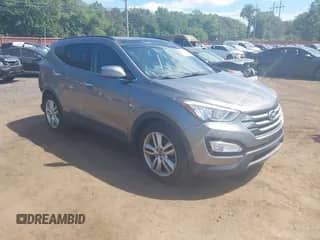 2015 Hyundai Santa Fe z VIN 5XYZWDLA4FG262429, wystawiony jako IAAI lot #43118323 z przebiegiem 105 391 mil mil oraz . Historia ofert i sprzedaży dostępna na DreamBid. Obrazek 1.