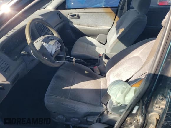 ✅ 2003 Kia Optima LX • VIN: KNAGD126635191079 • Лот: 47490495. Опубликован ранее на Copart с пробегом 209 786 миль. Бесплатный доступ к архиву аукционных продаж из США и подробный отчёт об истории автомобиля на DreamBid. Изображение 7.