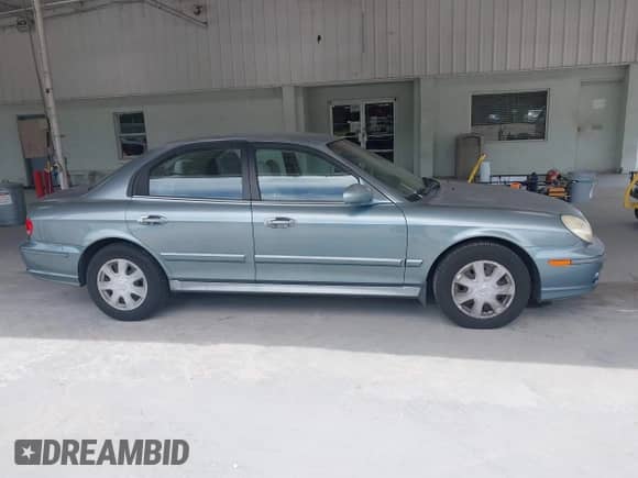 2004 Hyundai Sonata with VIN KMHWF25H64A045393, listed as a IAAI auction lot 42645956 with 114,112 mi miles and . Bid and sale history available at DreamBid. Image 13.