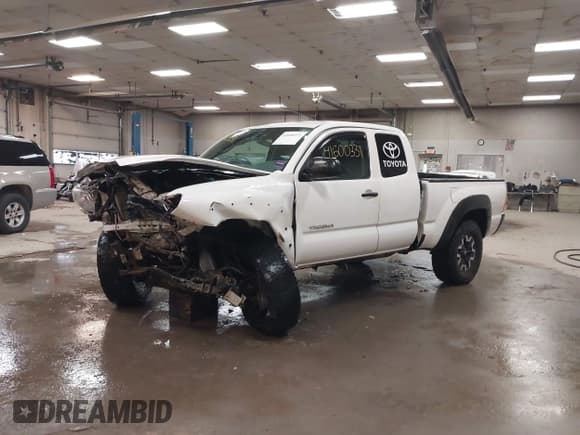 ✅ 2015 Toyota Tacoma • VIN: 5TFUX4EN9FX036973 • Lot: 41600331. Listed on IAAI with 150,343 mi. Free auction sales archive from the USA and detailed vehicle history report at DreamBid. Image 17.