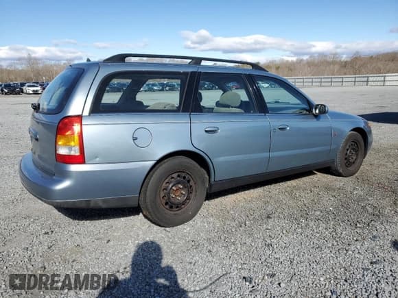 ✅ 2001 Saturn LW • VIN: 1G8JU84F01Y590560 • Lot: 48058405. Listed on Copart with 244,305 mi. Free auction sales archive from the USA and detailed vehicle history report at DreamBid. Image 3.