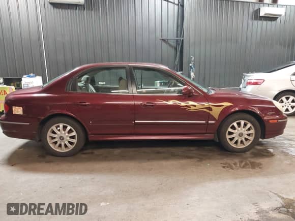 2003 Hyundai Sonata GLS z VIN KMHWF35H13A882475, wystawiony jako IAAI lot #41863570 z przebiegiem 168 303 mil mil oraz . Historia ofert i sprzedaży dostępna na DreamBid. Obrazek 13.